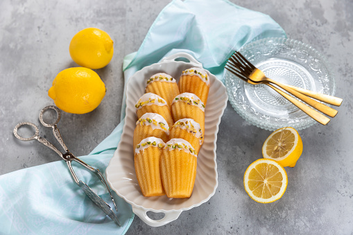 Homemade French Madeleine cookies with lemon icing