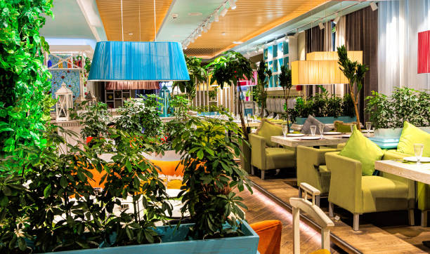 istock Interior of a modern cozy restaurant with fresh flowers and light interior 1484981195