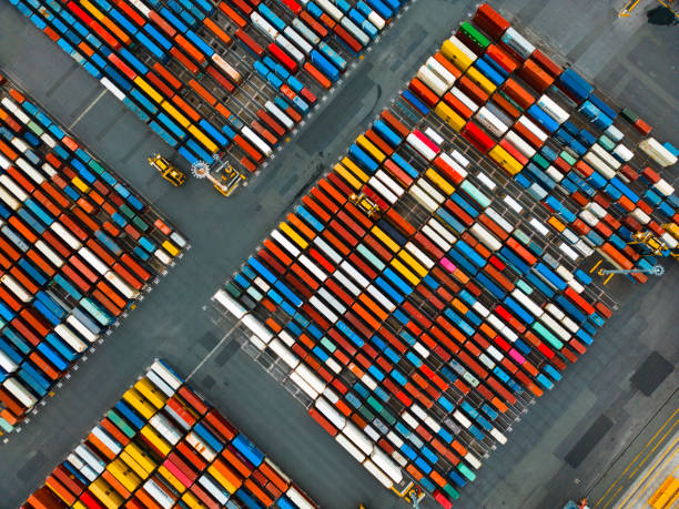 istock Containers of various colors are lined by the seaside. 1484989601