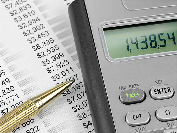 istock Tax Calculator and Pen 148499130
