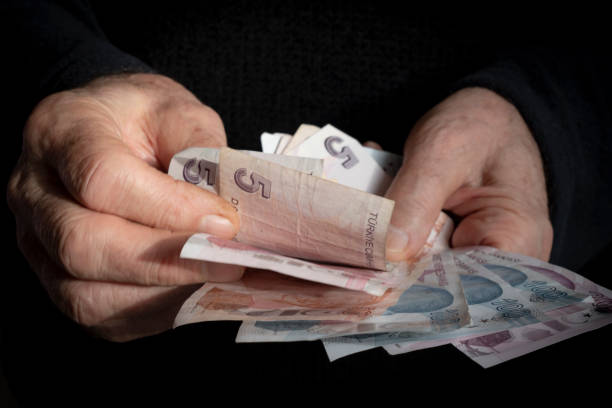 istock Man Giving Turkish Currency 1485004335
