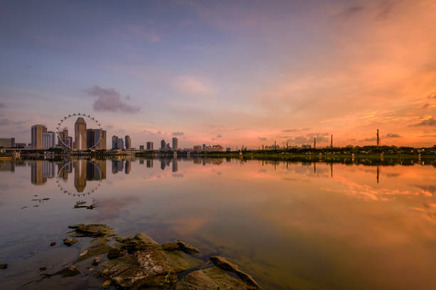 istock Vibrant sunrise background of central business district with perfect reflection 1485004592