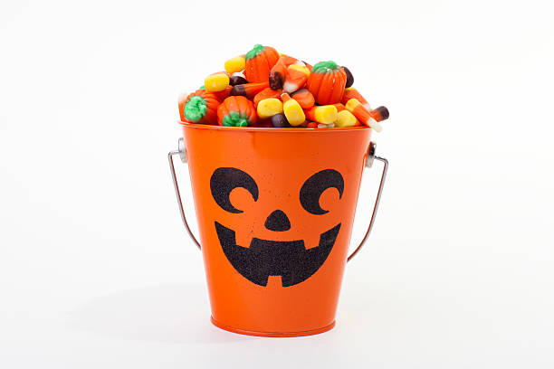 istock Bucket of Halloween Candy on White, Copy Space 148500720