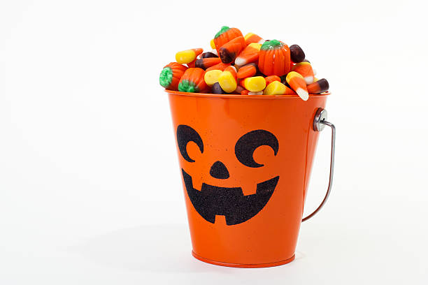 istock Bucket of Halloween Candy on White, Copy Space 148500723