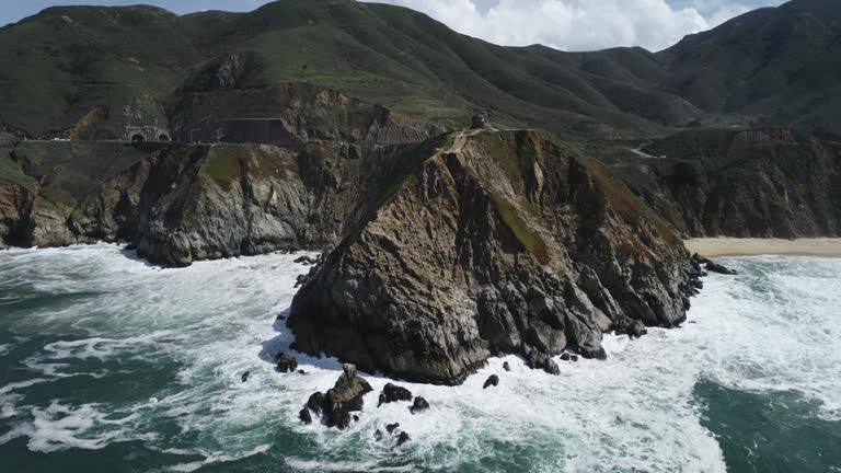 Devil's Slide Trail, Graffiti Hill and Bunker Point in Background. Gray Whale Cove State Beach in Background. Pacific Ocean Coastline and Waves. California State Route 1