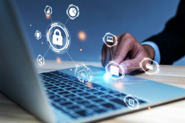 istock Cyber Security. business man hand working on laptop computer with virtual graphic icon diagram on desk at office, contact us, digital marketing, business finance, internet network technology concept 1485013852