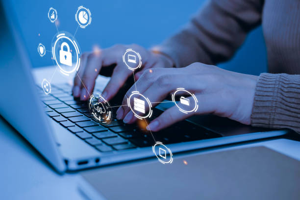 istock Network Security. people hand working on laptop computer with virtual graphic icon diagram on desk, contact us, cyber security, digital marketing, business finance, internet network technology concept 1485014031