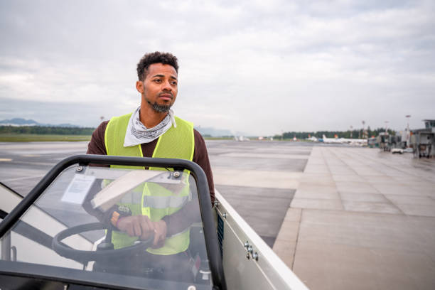 istock Hispanic Man Using A Machine To Locate A Staircase Outdoors In The Airport 1485015523