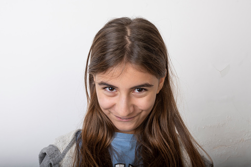 Beautiful little girl posing indoors