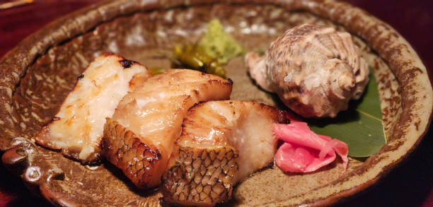 istock a delicious baked fish on the plate 1485035120