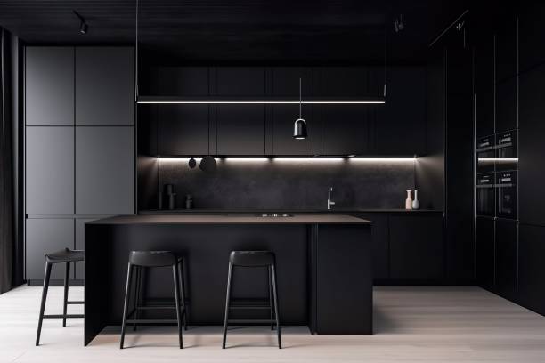schlanke und moderne, dunkelschwarze küche strahlt industriellen rand und raffinierten stil aus - dark edge stock-fotos und bilder