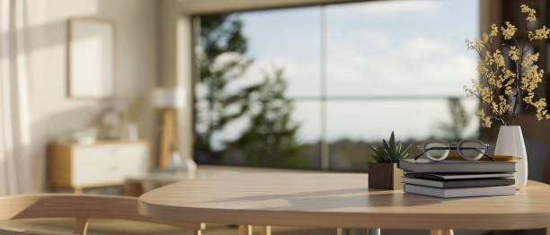 istock Copy space on wood study table with decor plant in modern minimal living room 1485037500