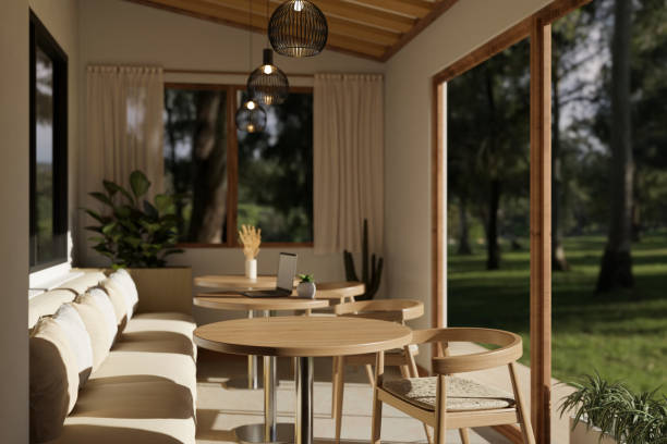 istock Beautiful minimal and cozy cafe interior design with wooden table, comfortable couch 1485037502