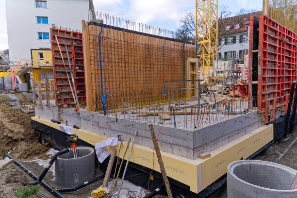 Ground level of construction site of building at Swiss town. Construction site of apartment house with formwork and gully tubes at City of Zürich district Schwamendingen on a cloudy spring day. Photo taken April 4th, 2023, Zurich, Switzerland. concrete in formwork stock pictures, royalty-free photos & images