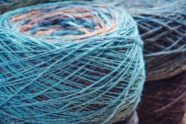 istock Round skeins of organic multi-coloured lambswool yarn. 1485043906
