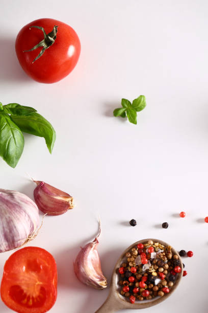istock food background with fresh garlic herbs on white background 1485045700
