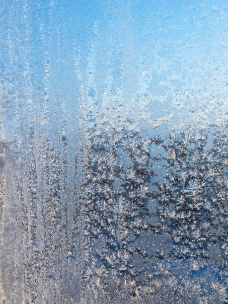 istock frost on home window glass illuminated by sun 1485046672