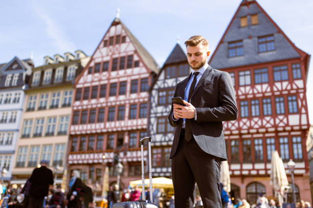 Business on the Go: Young Professional in Frankfurt stock photo