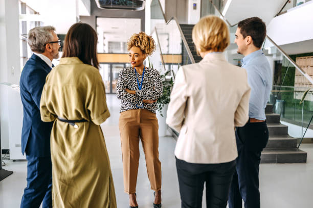 istock Team meeting in the office hallway 1485046973