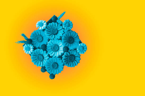 istock Decorative floral gift box with on yellow background. Top view copy space for mock 1485047287