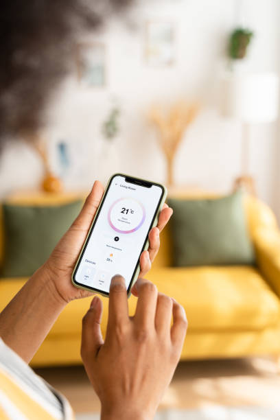 istock Crop woman using smartphone at home 1485047402