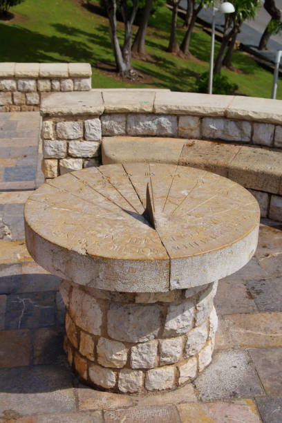 Ancient sundial in the city of Tarragona. The picture was taken in Spain, in the ancient city of Tarragona. The picture shows the Ancient Roman sundial. ancient sundial stock pictures, royalty-free photos & images