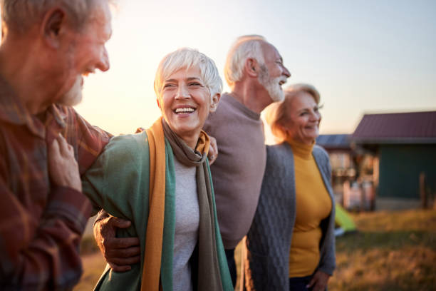 istock Happy mature couples talking while walking in autumn day. 1485048074