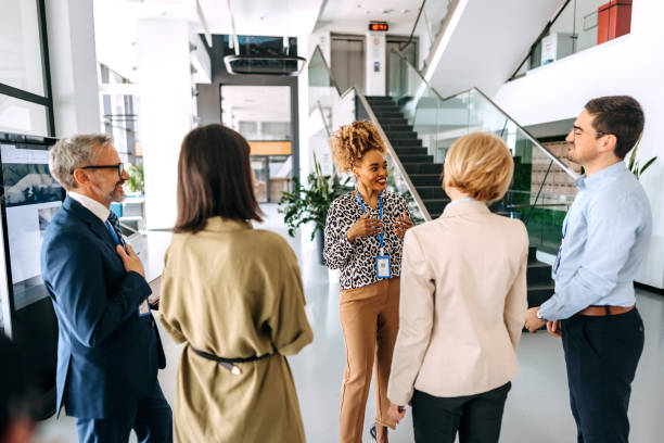 istock Team meeting in the office hallway 1485048262