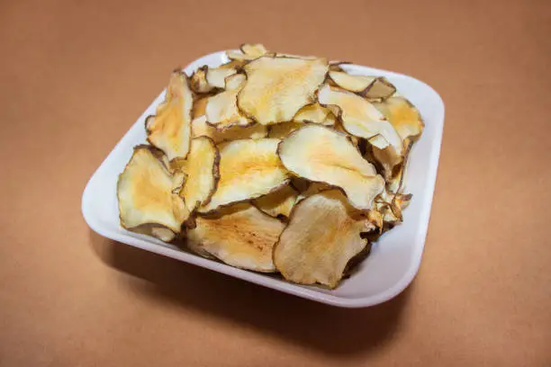 Homemade organic Jerusalem artichoke chips snack.