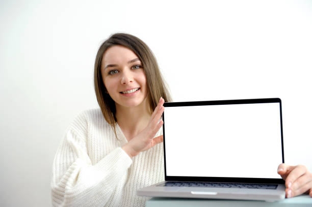 istock Woman freelancer is working on a new project on computer. White Display. 1485051141