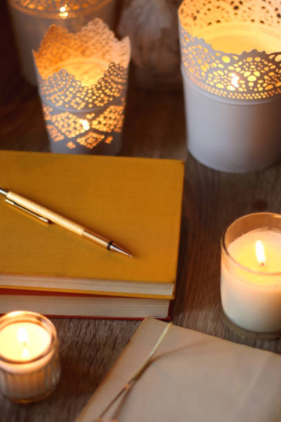 istock Books, Glasses, E-Reader, Pen, Tea, Cookies and Candles 1485052815