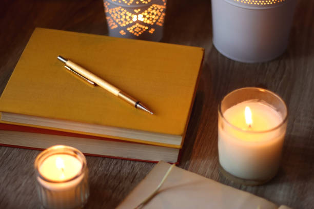 istock Books, Glasses, E-Reader, Pen, Tea, Cookies and Candles 1485052816