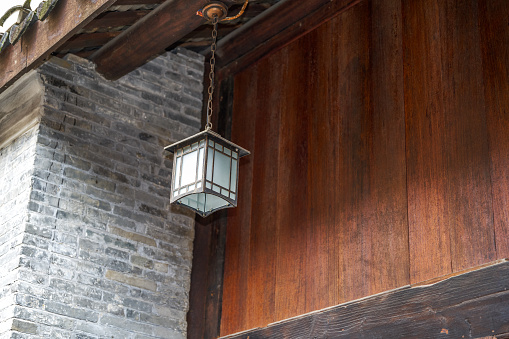 Close-up of wooden traditional chandelier in ancient Chinese building