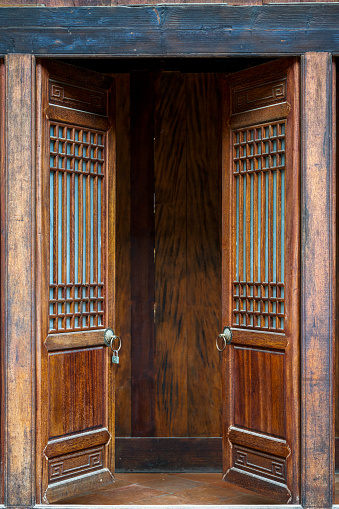 Close-up of traditional wooden door in ancient Chinese building