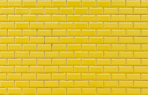 Panel of yellow tiles. Yellow background.