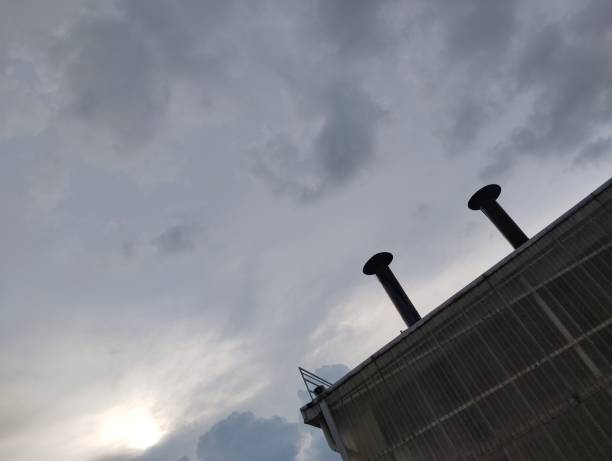 istock boiler chimneys and cloudy skies 1485067110