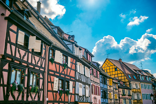 La Petite Venise Colmar city street view in the French Alsace during a summer day. Colmar is famous for its traditional architecture with timber framing in the old town and canals that run through the city. This area is called Little Venice.