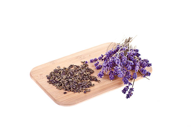 istock Lavender and green tea on wooden desk 148506772