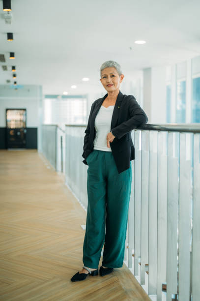 istock Standing Tall: A Confident Middle-Aged Woman in Her Workplace 1485077015