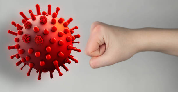 istock Hand gesture, stop virus. Human hand, fist shows stop to red microbe, virus, bacterium. 1485077064