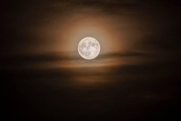 istock Shining moon in the cloudy sky 1485078413