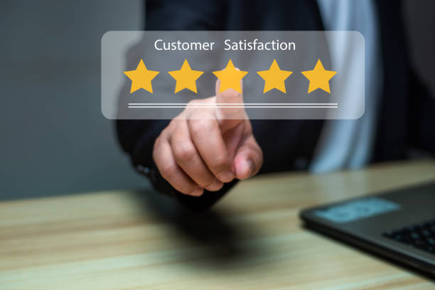 istock Man using laptop and touch virtual screen and give five star symbol to increase rating of product and service concept, Customer satisfaction, selective focus. 1485078924