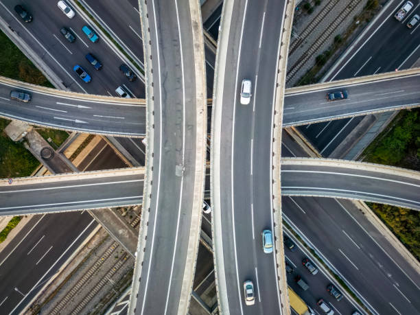 istock Aerial top down view of a symmetrical highway flyover interchange 1485082543