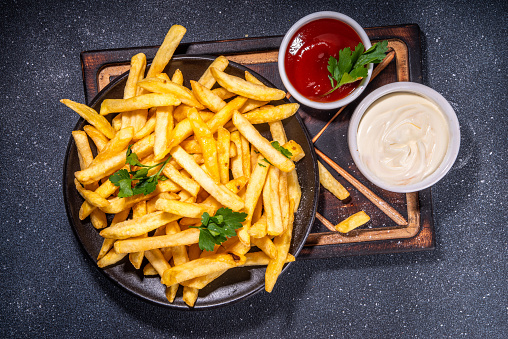 French fries bucket served in dish isolated on marble background top view on hong kong food