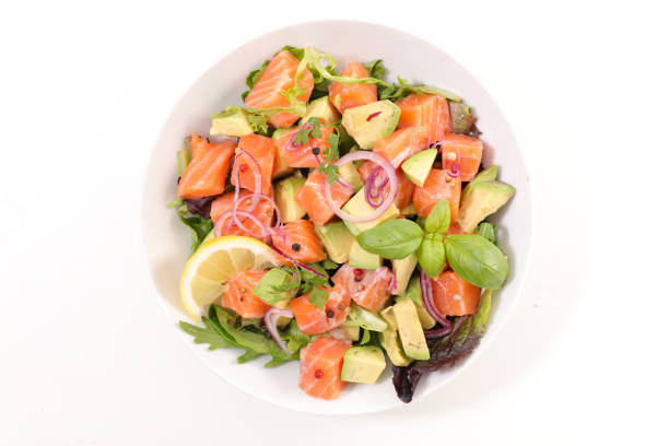 istock fresh mixed salad with avocado, salmon and basil on white background 1485084142