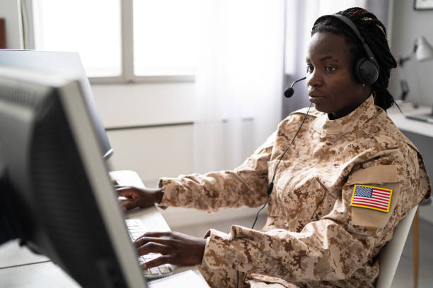 istock Woman soldier working at military office 1485085069