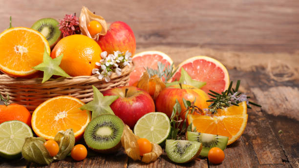 istock assorted of fresh fruits- orange, grapefruit, apple and kiwi 1485085372