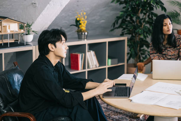 istock Multi-ethnic colleagues working together at the office 1485086815