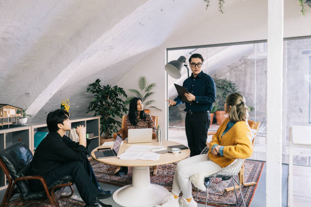 istock Team meeting at stylish start up office. 1485086831