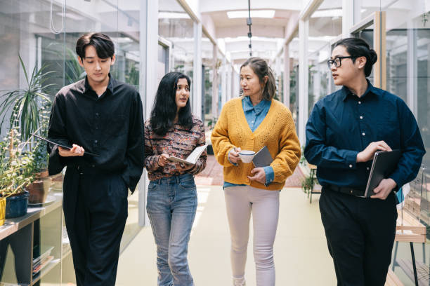 istock Entrepreneurs changing ideas at coworking space 1485086872